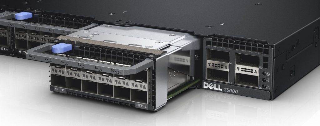A close up rendering of the Dell S5000, highlighting all of removable trays and all of the ports on the trays on the console.