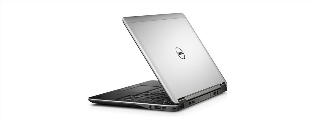 The Dell Latitude E6000, turned away from the front to highlight the logo on the back and the 9 ports on the back and side.