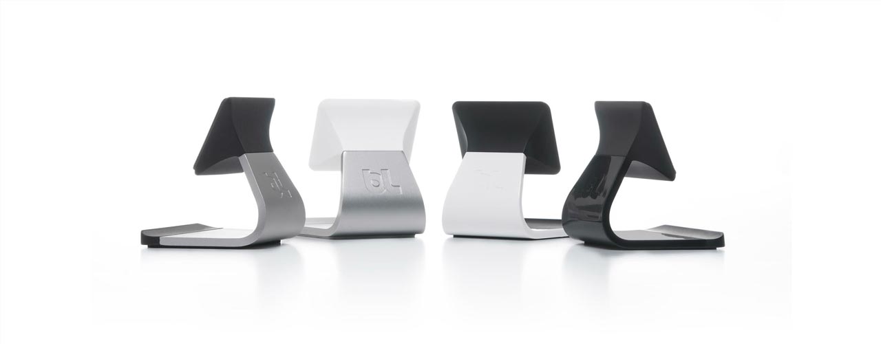 Four color variants of the bluelounge Milo, all sitting on a white table.
