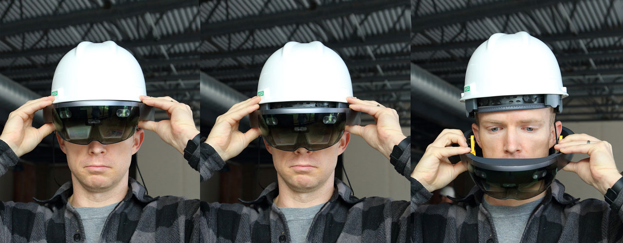 A man in a gray flannel wearing the Trimble Connect for Hololens, holding the Hololens, unlocking the Hololens and removing the Hololens.