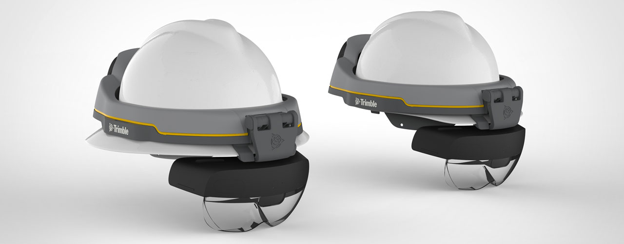 Two renderings of the Trimble XR10s attached to white hard hats.