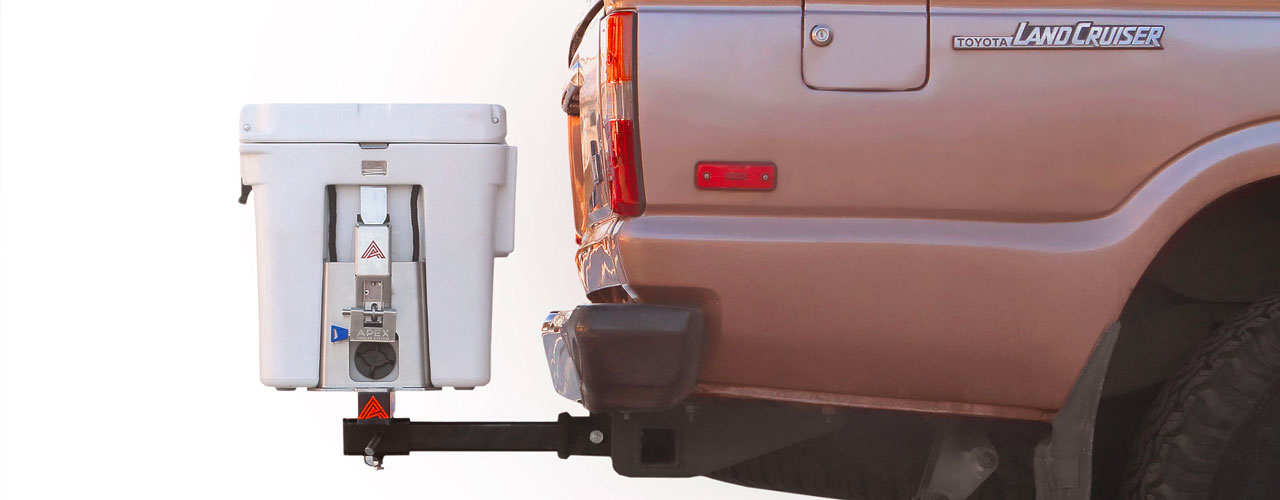 The Apex cooler mount and Apex cooler attached to the back of a Toyota Land Cruiser.