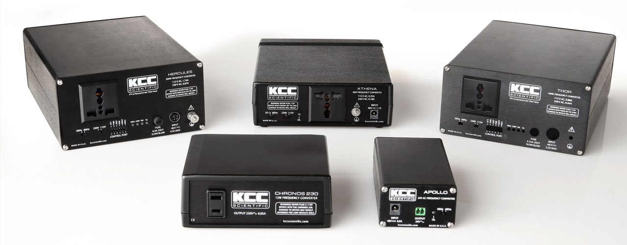 Five of the KCC line of Ultra-High Precision Frequency Converters spread out.