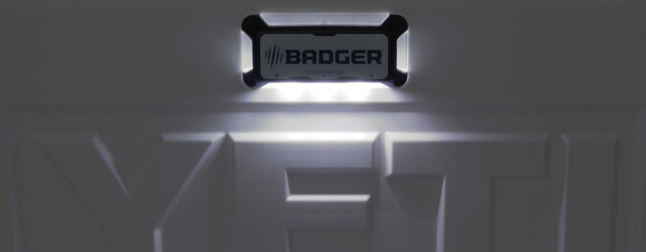 Cooler Extras' Badger line of an internal cooler light attached to a Yeti cooler turned on.