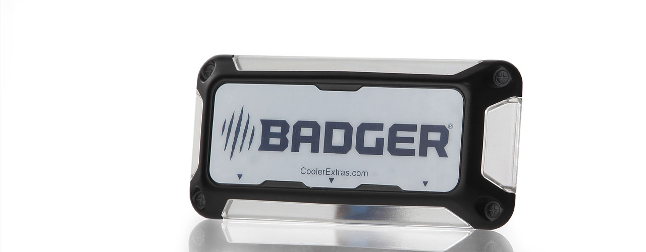 Cooler Extras' Badger line of an internal cooler lights. The cooler light is sitting on a reflective surface.