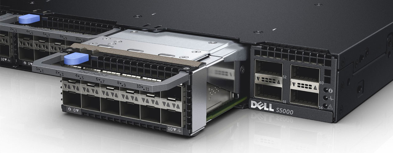 A close up rendering of the Dell S5000, highlighting all of removable trays and all of the ports on the trays on the console.