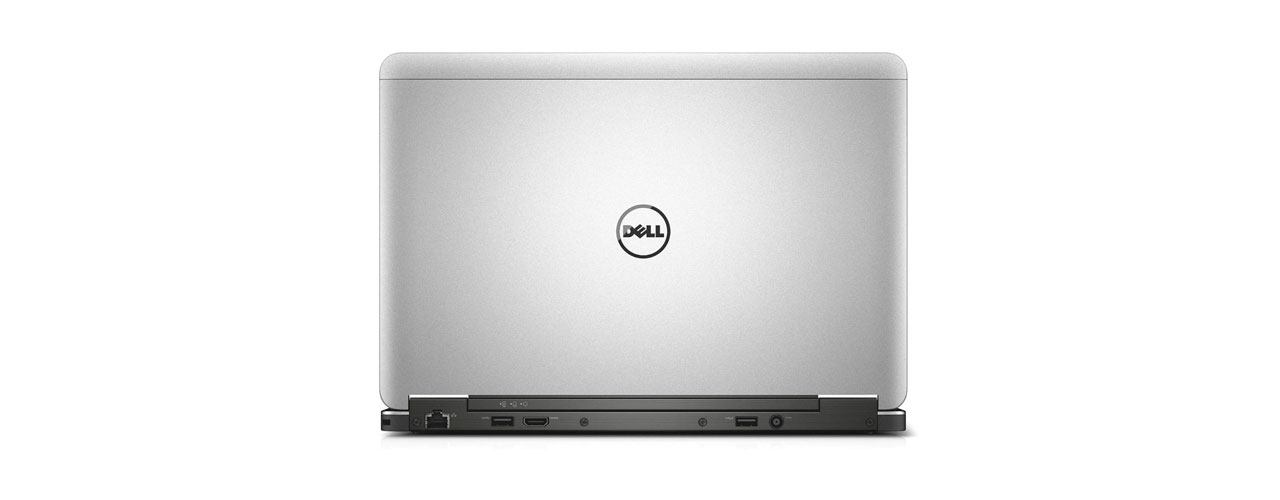 The Dell Latitude E6000, turned fully away from the front to highlight the logo on the back and the 5 back ports.